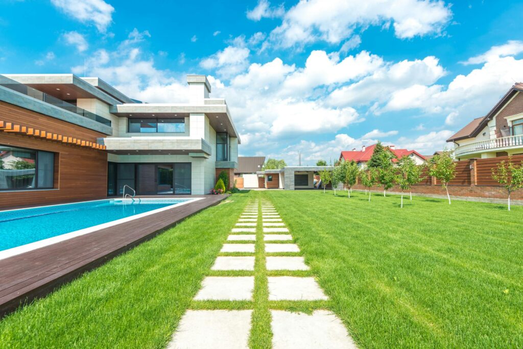 Luxury Florida home with outdoor living area and pool, representing primary residence homestead benefits.