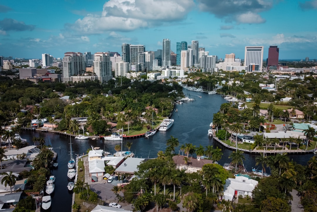 Real estate broker conducting a private showing of a luxury South Florida home.