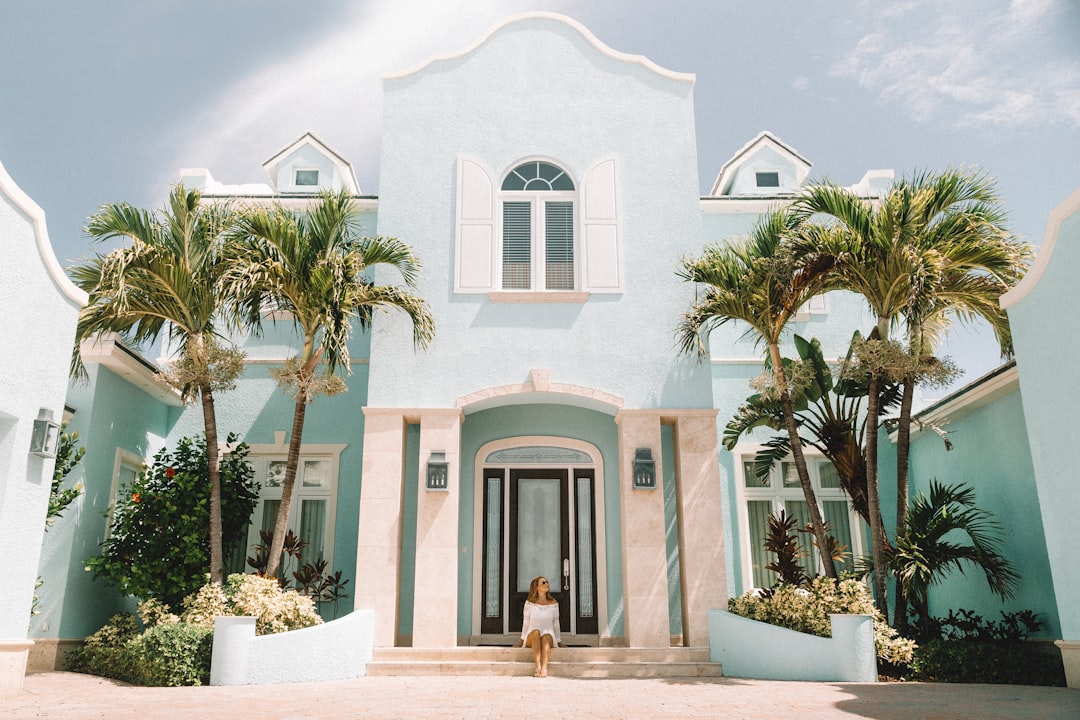Real estate agent conducting a private showing of a luxury South Florida home.