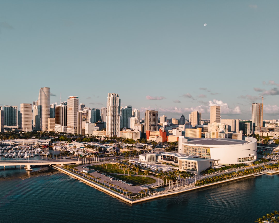 Aerial view of Miami apartment buildings and skyline along the waterfront.