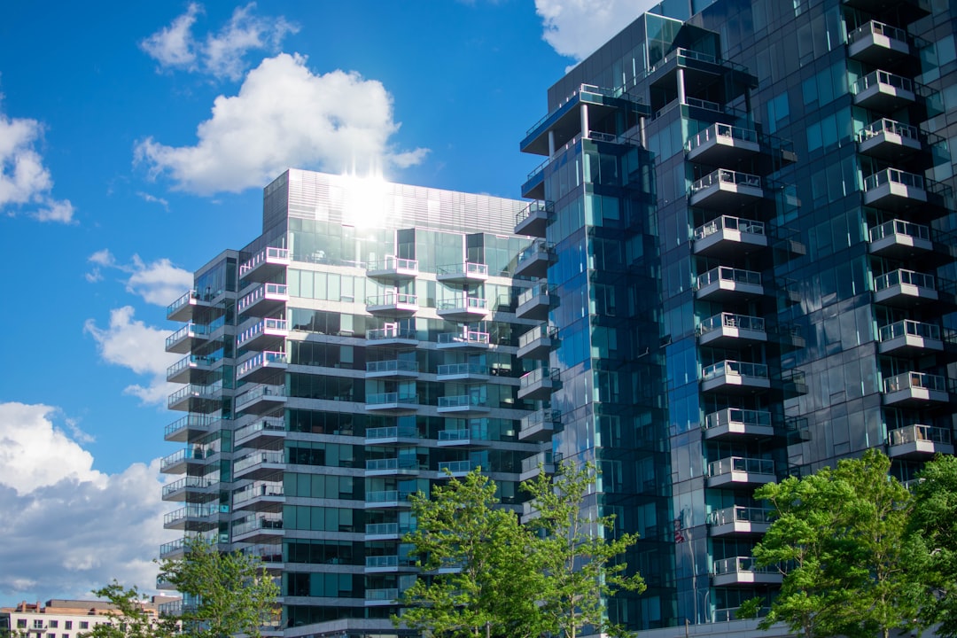 Buyer signing a pre-construction luxury condo contract and deposit agreement with a Miami developer.
