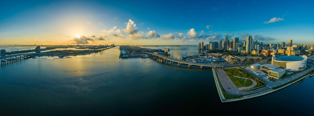 Aerial view of a luxury South Florida waterfront estate with pool and ocean access.