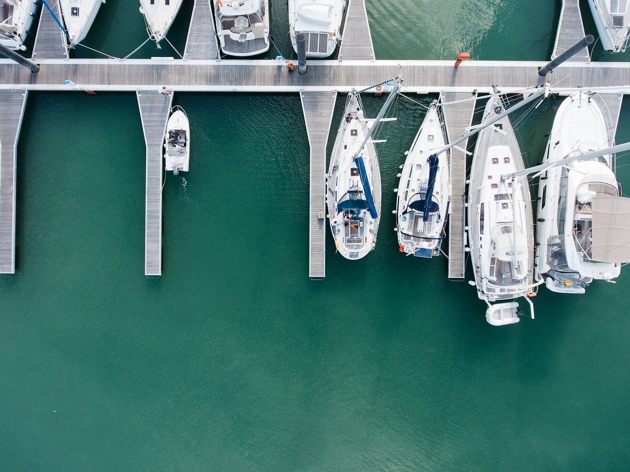 South Florida luxury waterfront home with private dock and boat lift before hurricane season.