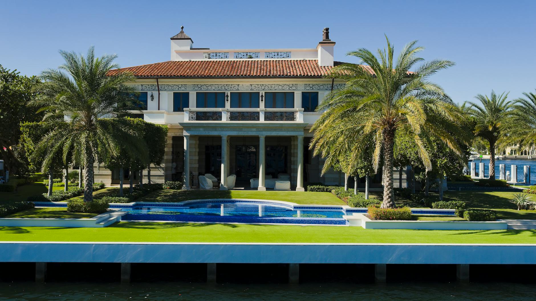 Luxury South Florida waterfront estate with private pool and boat dock on the Intracoastal Waterway.