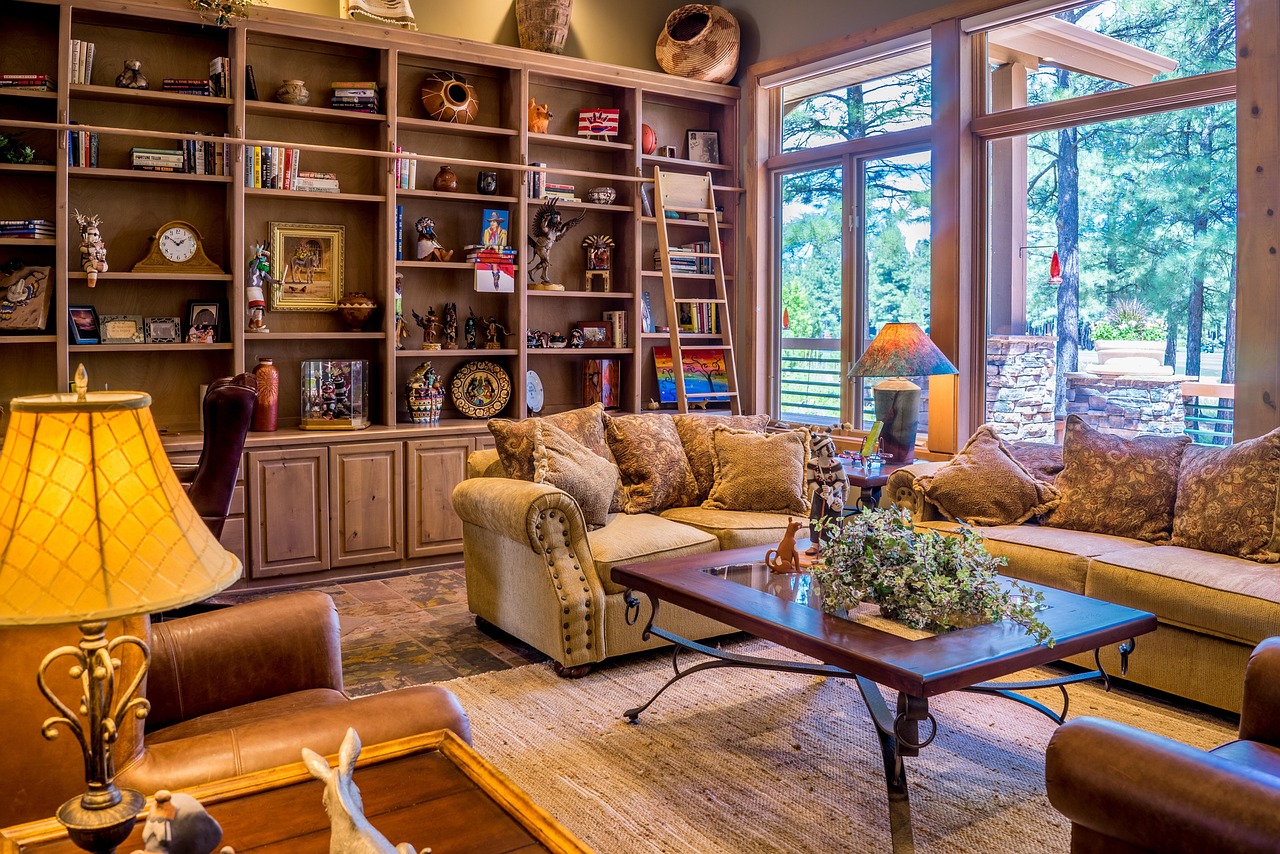 Professionally staged luxury living room with designer furniture and art in a South Florida estate.