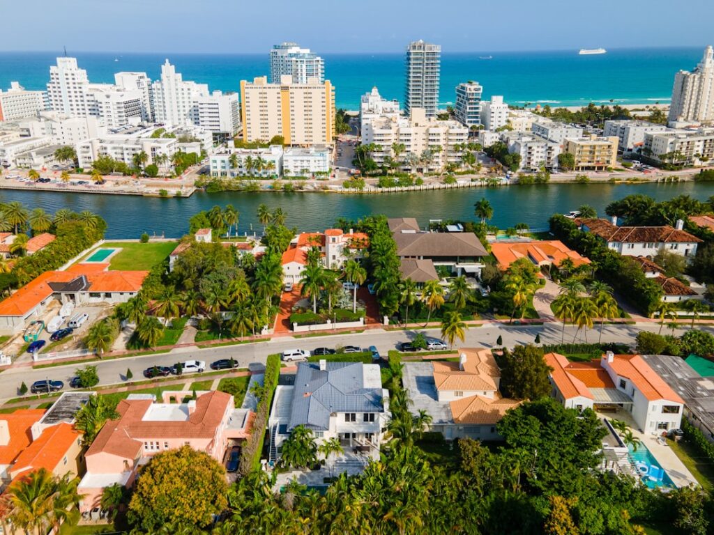 Florida luxury real estate closing with attorney reviewing title insurance documents.