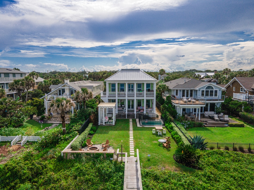 Professional home inspector conducting a 4-point inspection at a Florida luxury property.