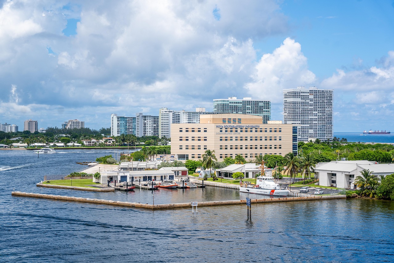 Large luxury yacht docked at a private waterfront estate in Fort Lauderdale, South Florida.