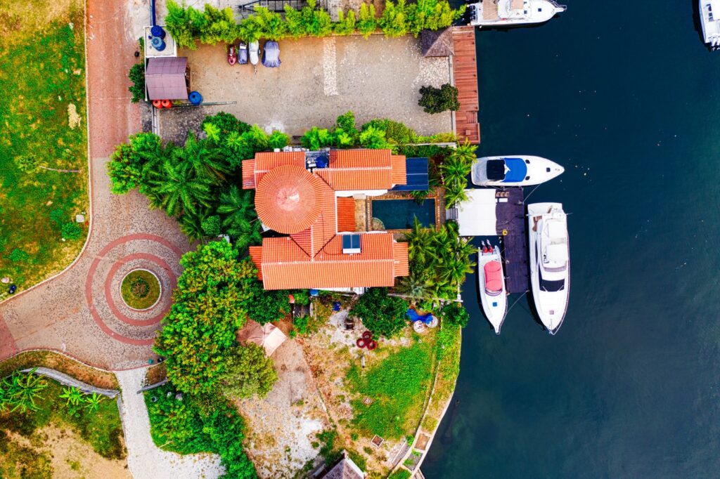 Luxury waterfront estate on Tampa Bay with private boat dock and open water views.