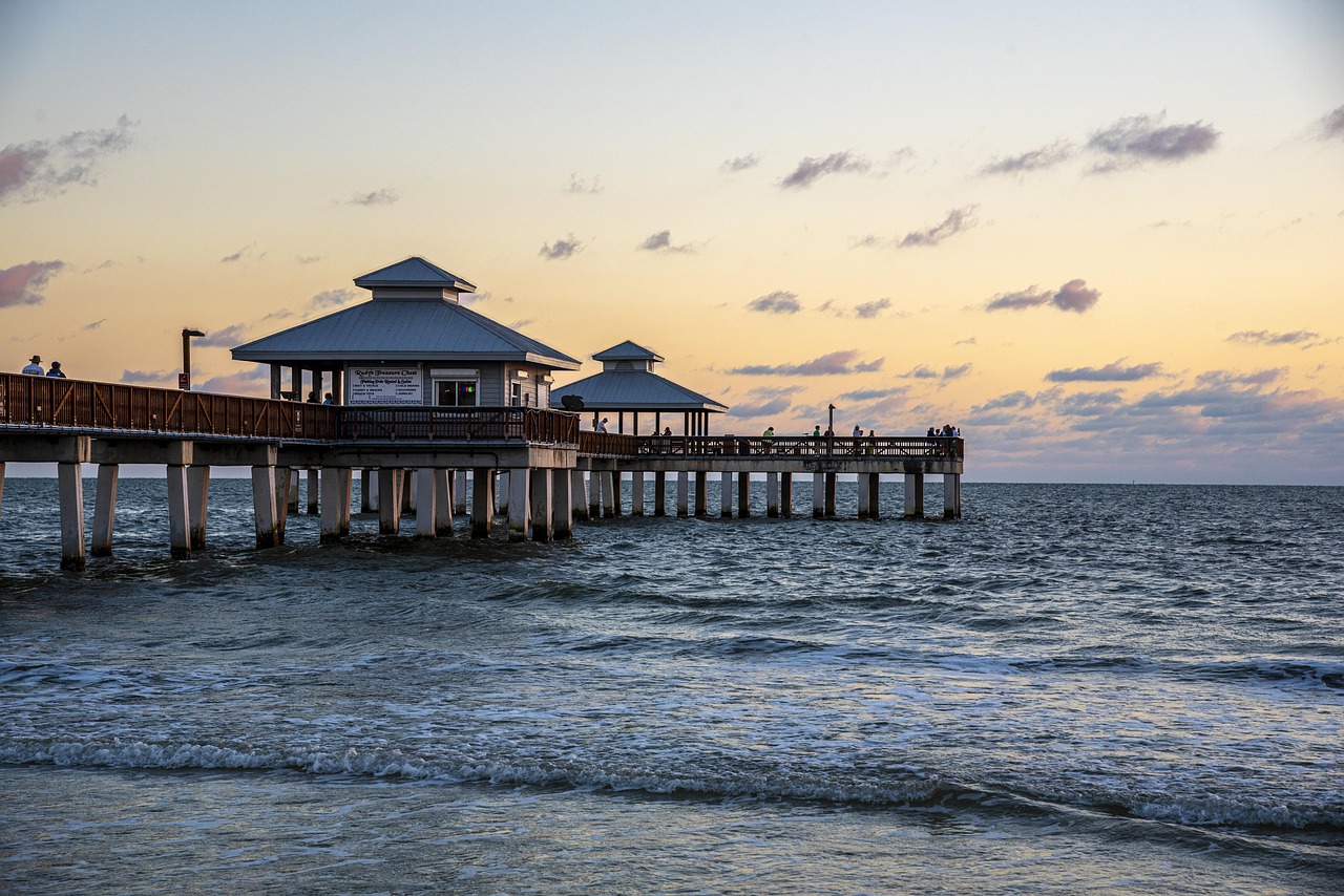 Aerial view of Clearwater Beach Florida with luxury Gulf-front condos and clear water.