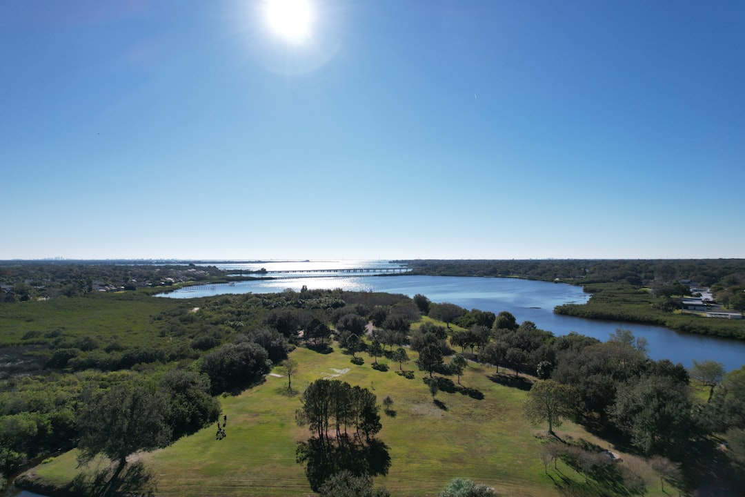 Elevated new construction coastal home in Tampa Bay Florida built above flood zone base elevation.