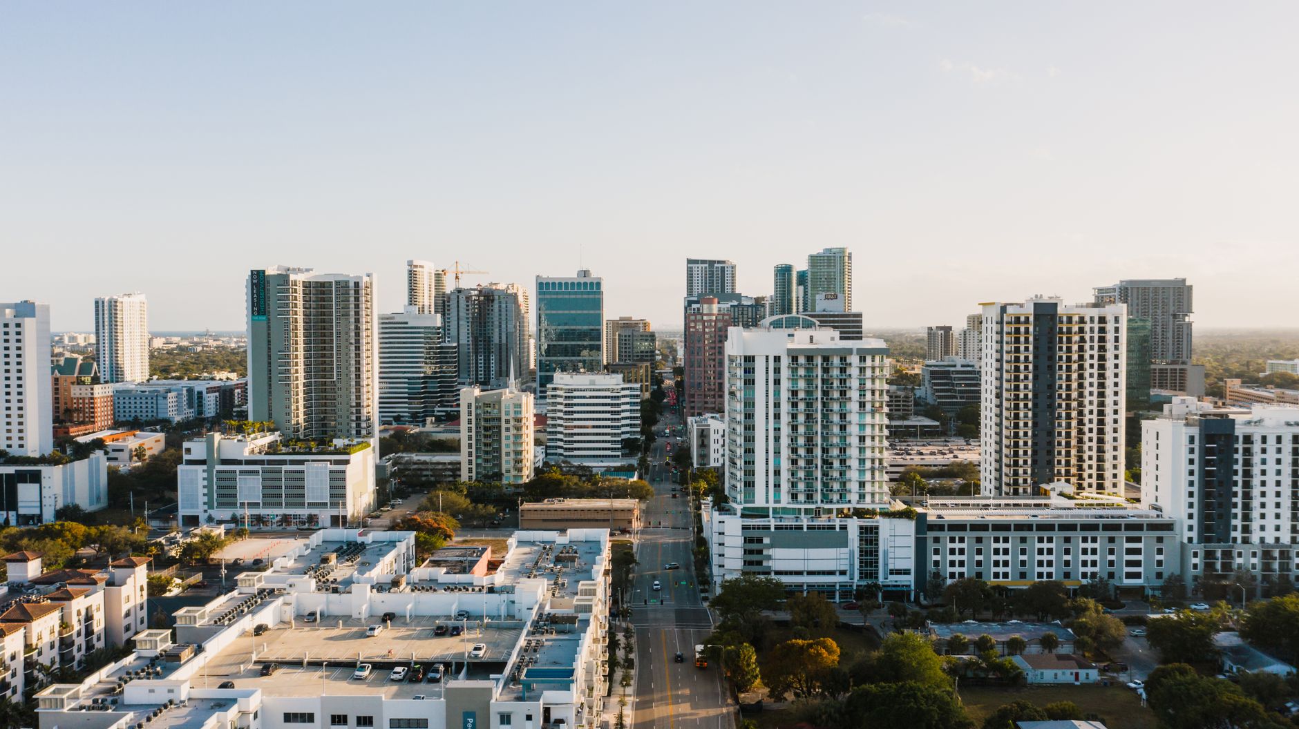 Luxury high-rise condominium building in Miami showing the type of properties entering distress in 2026.