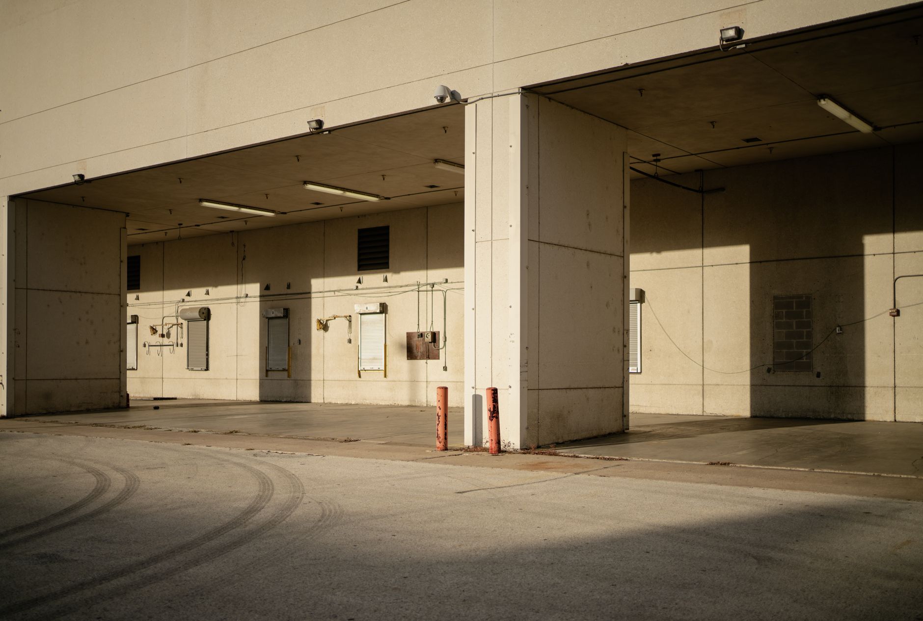 Modern South Florida industrial warehouse with loading dock doors and large clear-height facility.