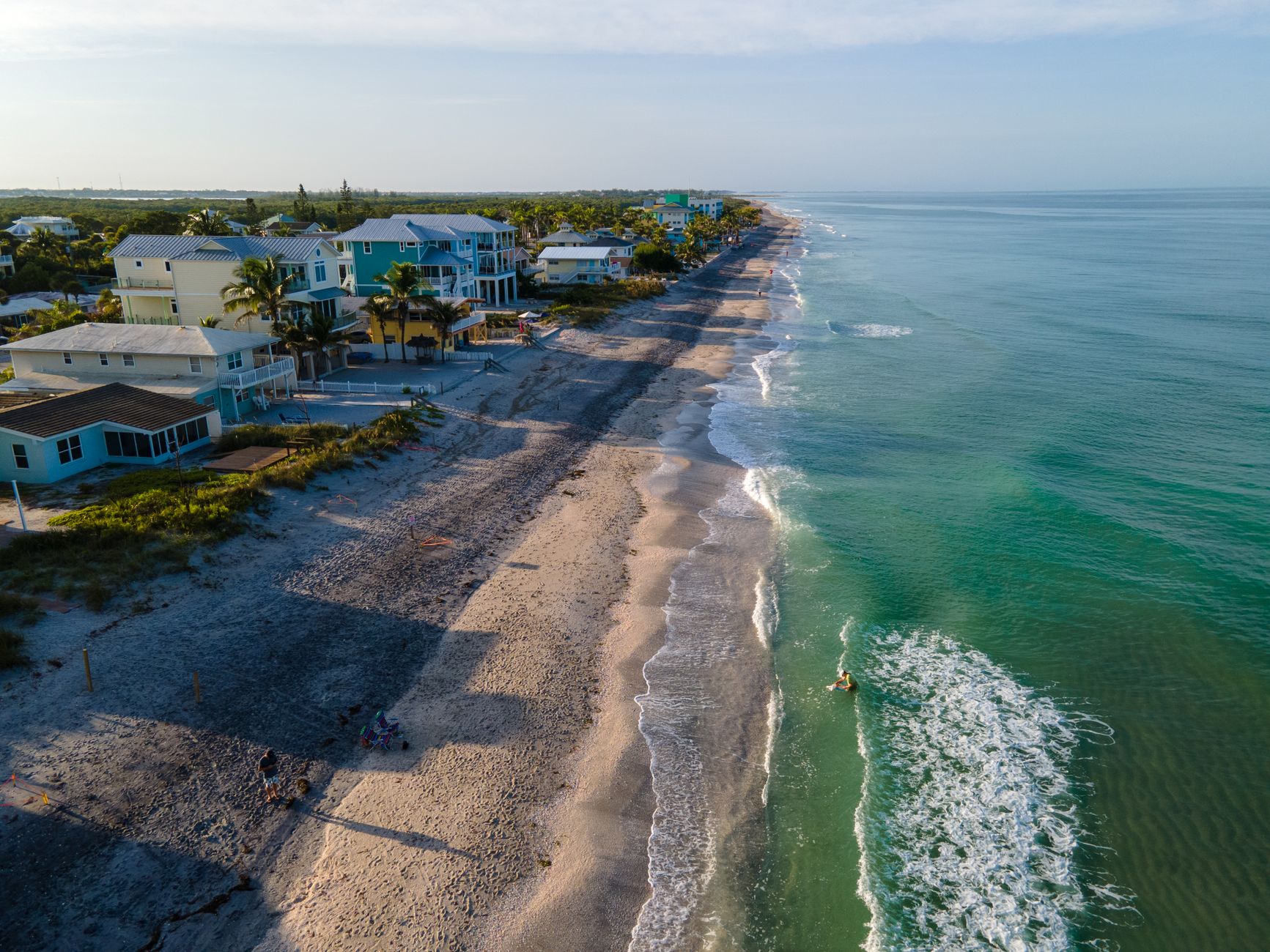 Aerial view of South Florida coastal neighborhood with vacation rental properties.