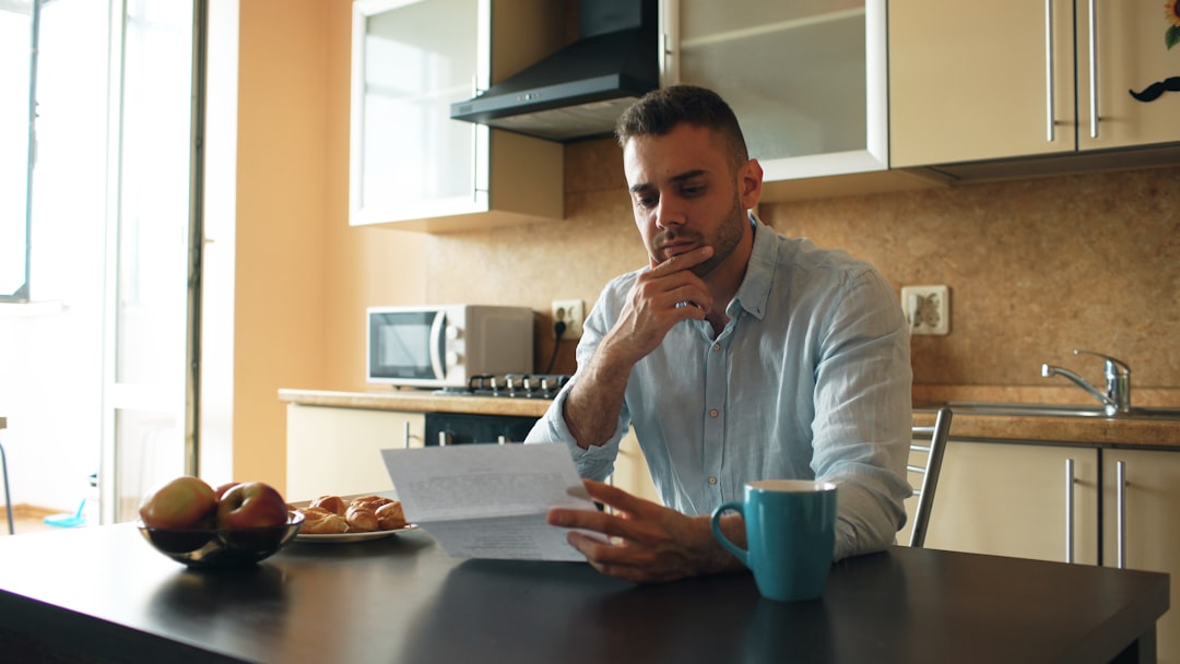 Loan officer reviewing jumbo mortgage documents for a luxury Florida property purchase