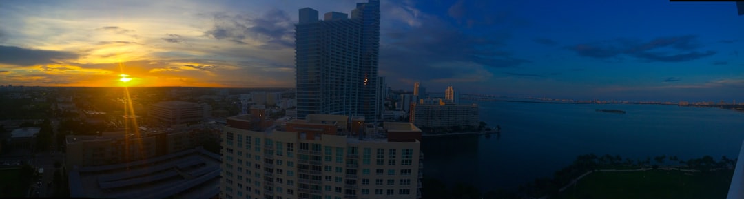 Miami luxury condominium tower exterior with ocean view balconies