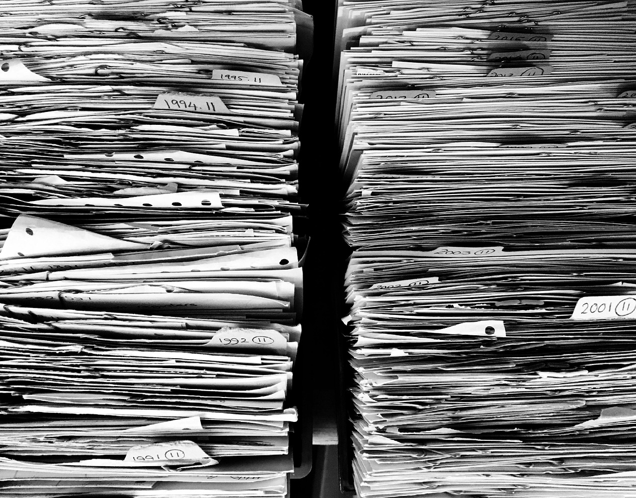 Title company attorney reviewing FIRPTA closing paperwork in a Florida office