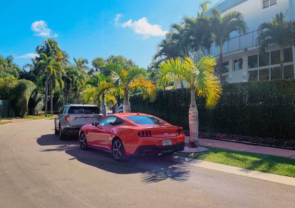 Moving truck outside a Florida luxury waterfront home during a homestead relocation