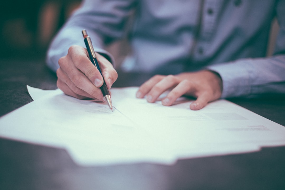 Buyer and agent reviewing condo disclosure documents before closing in Florida