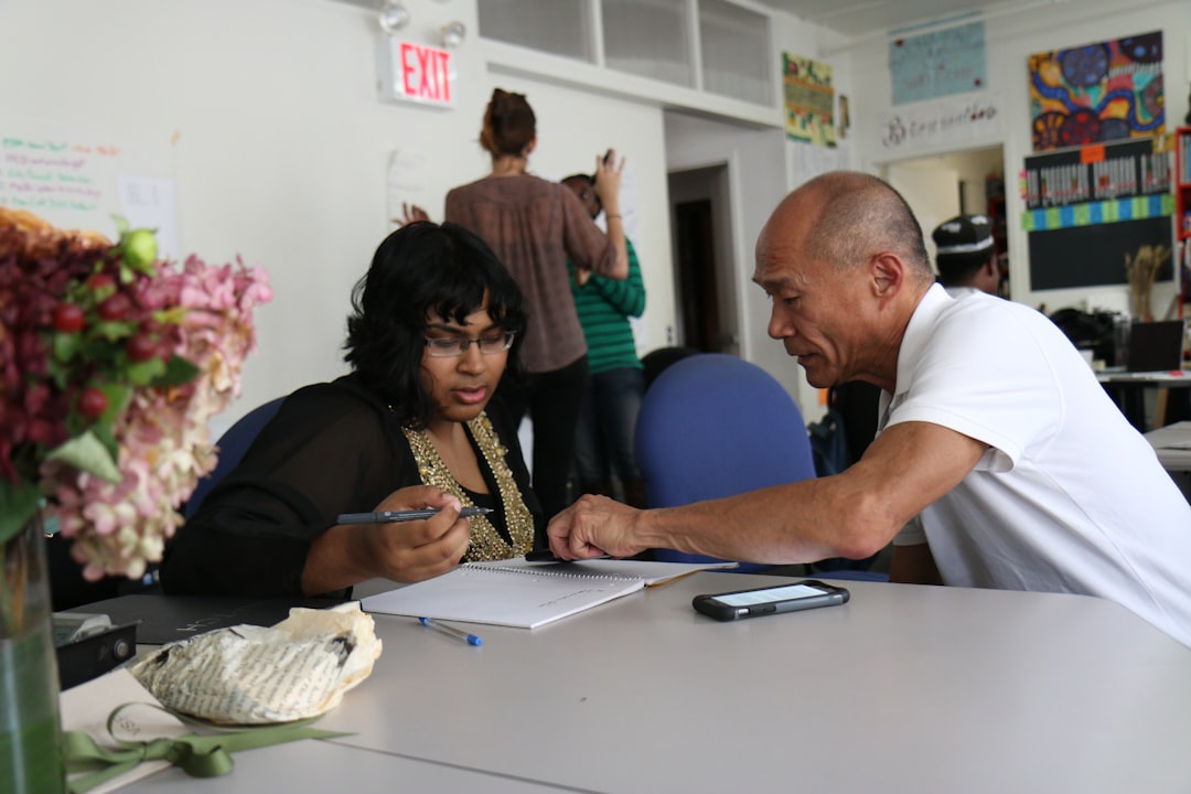 International buyer signing a luxury pre-construction condo purchase contract