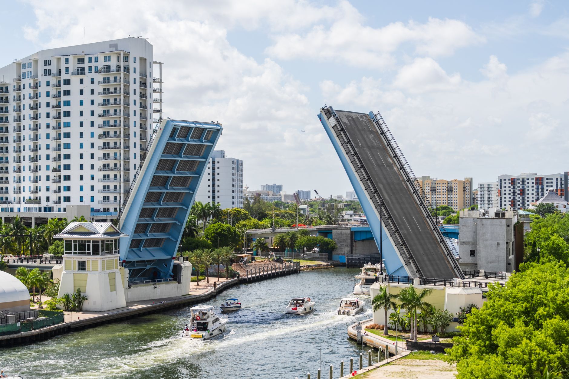 Yacht navigating a South Florida canal with no fixed bridge restricting clearance
