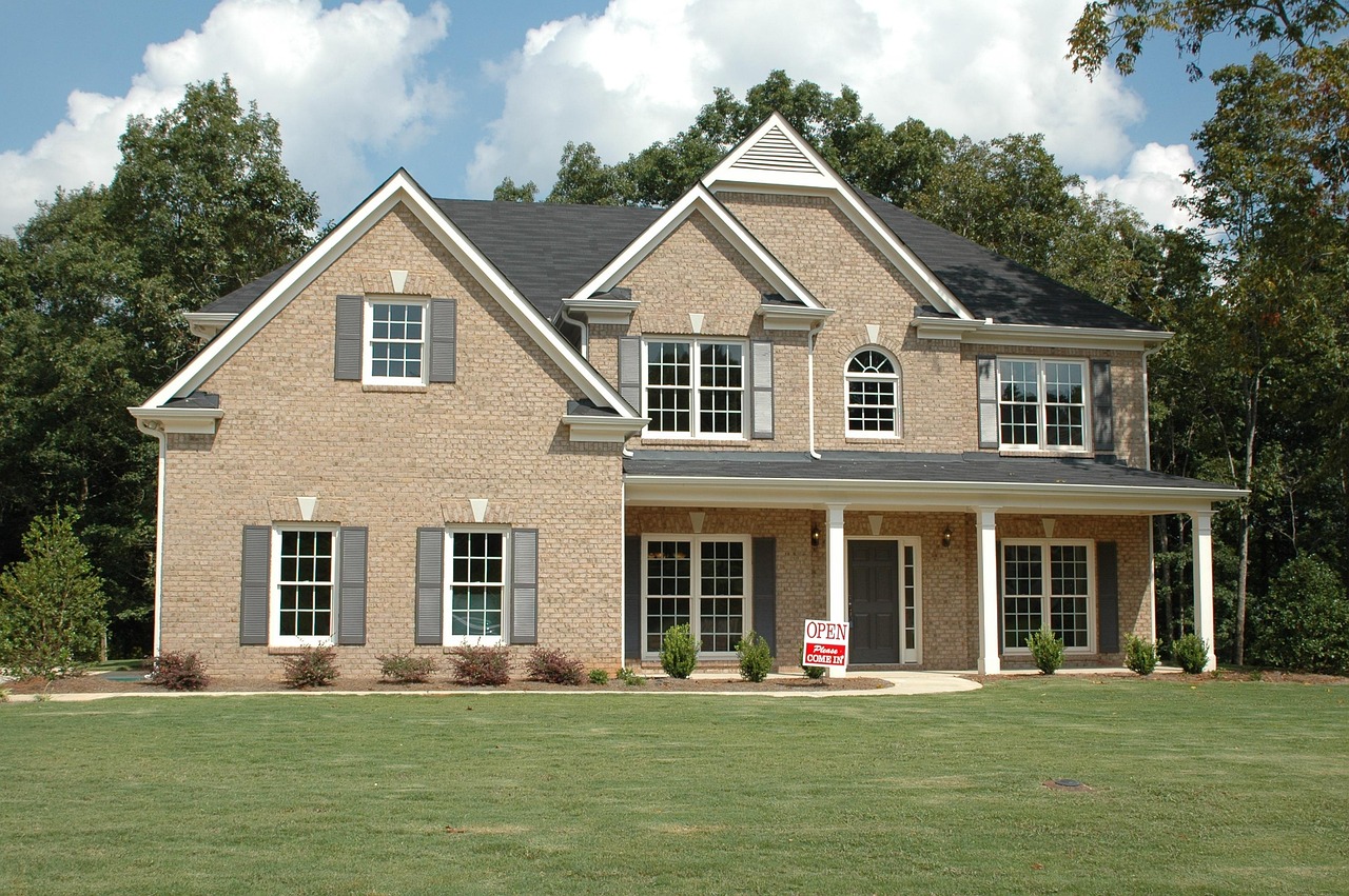 Buyers reviewing compensation terms in a buyer broker agreement with their real estate agent