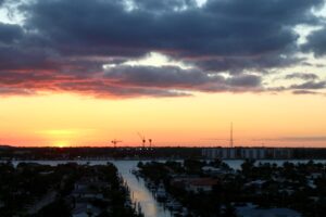 Modern multi-story self-storage facility in Florida at sunset