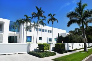 Luxury Florida home with a new addition under construction, illustrating unpermitted work checks for buyers