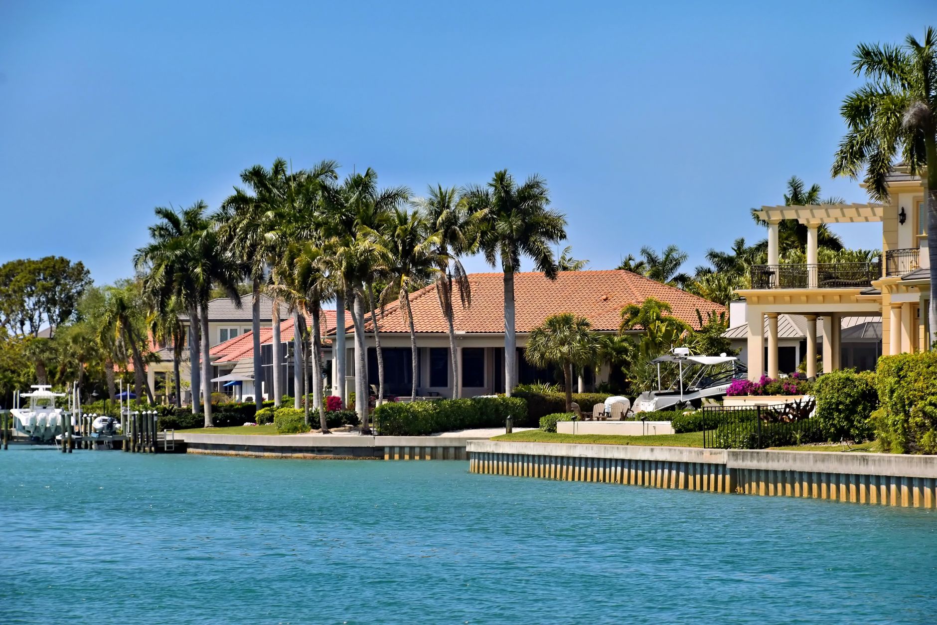 Covered loggia and outdoor kitchen at a South Florida luxury home