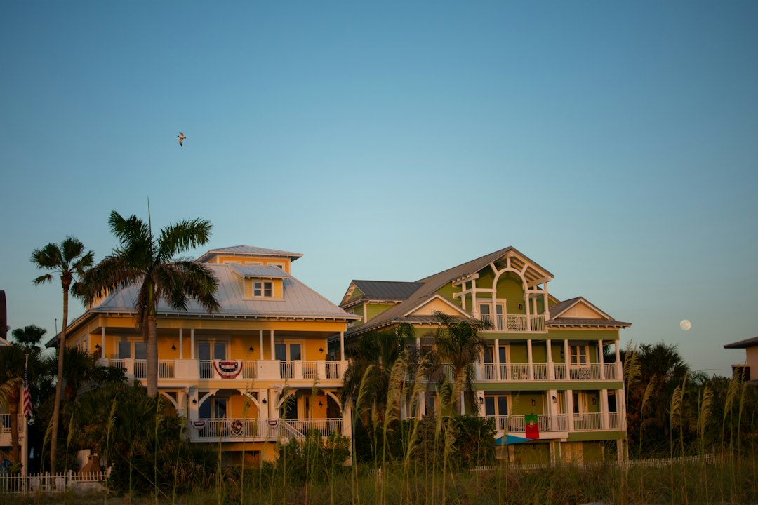 Architect reviewing measured drawings to legalize an addition at a Florida luxury home