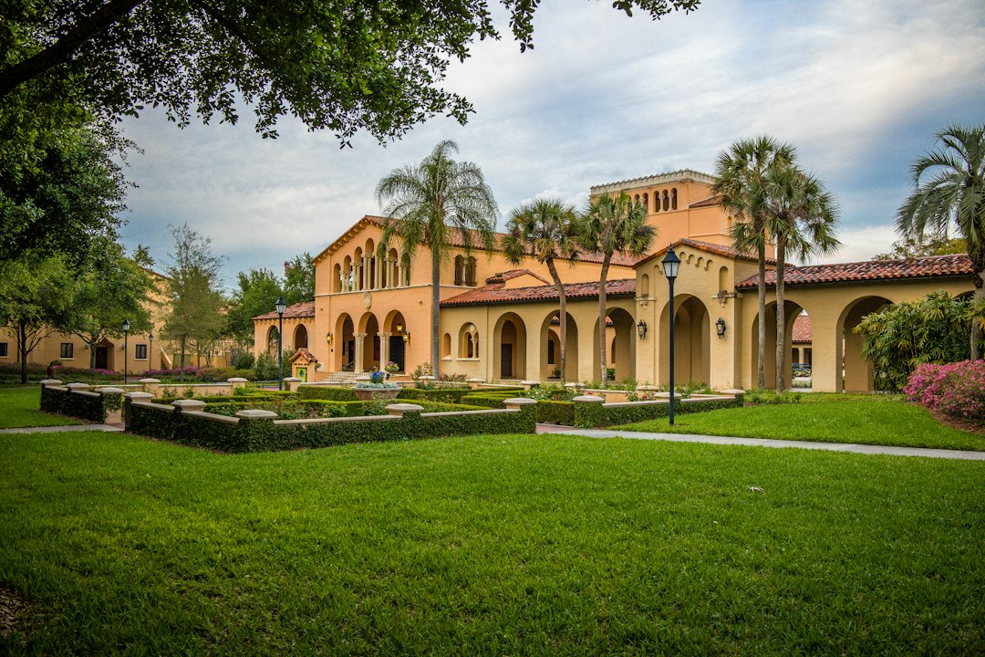 Florida luxury estate exterior showing roof and air conditioning equipment reviewed in a four-point inspection