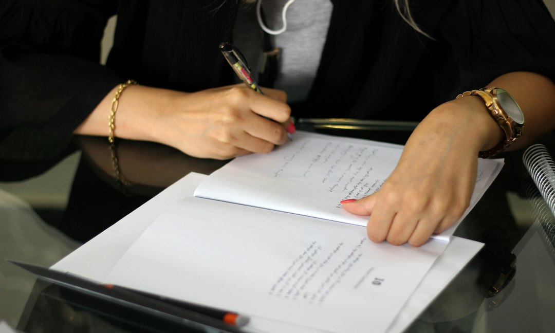 Luxury home buyer reviewing a Florida real estate contract and appraisal addendum with an attorney