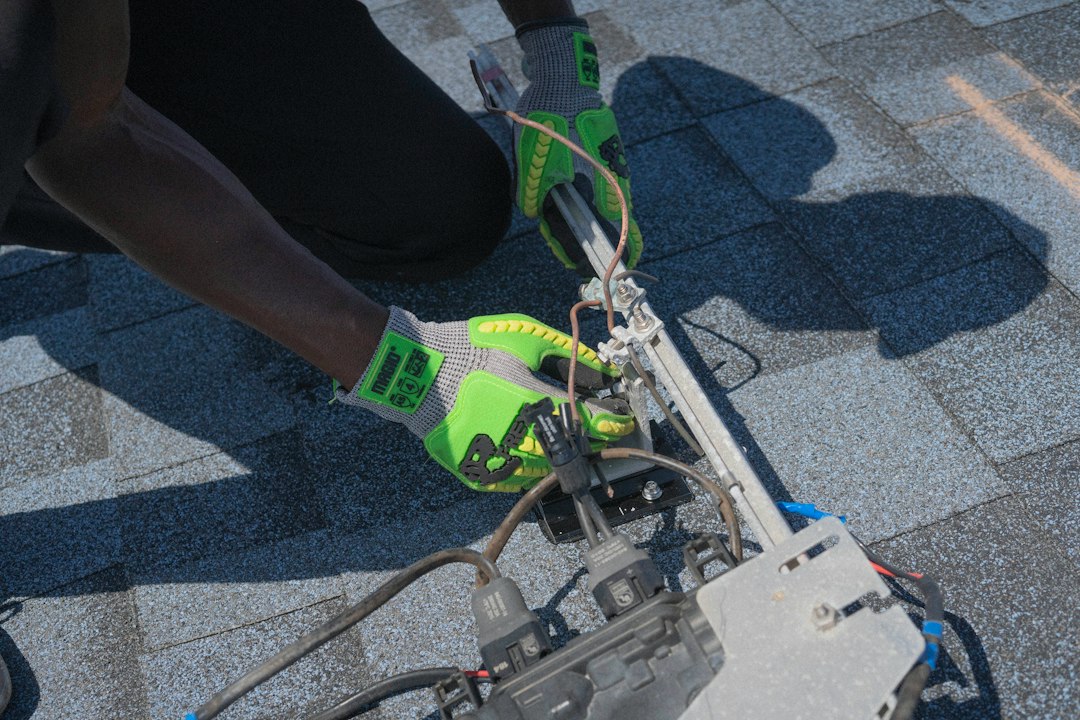 Contractor repairing the roof of a luxury Florida home before it is listed
