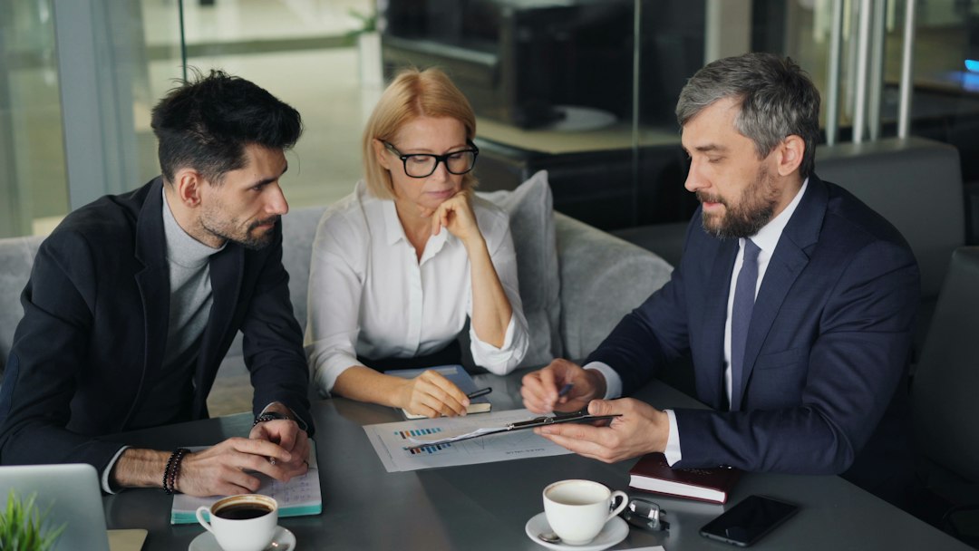Luxury home buyer reviewing a brokerage agreement with a Florida real estate broker