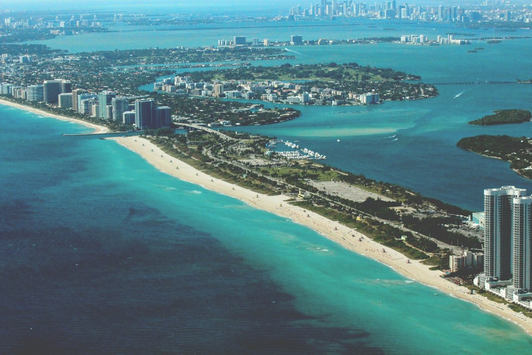 Buyer signing a brokerage relationship change on a Florida luxury purchase